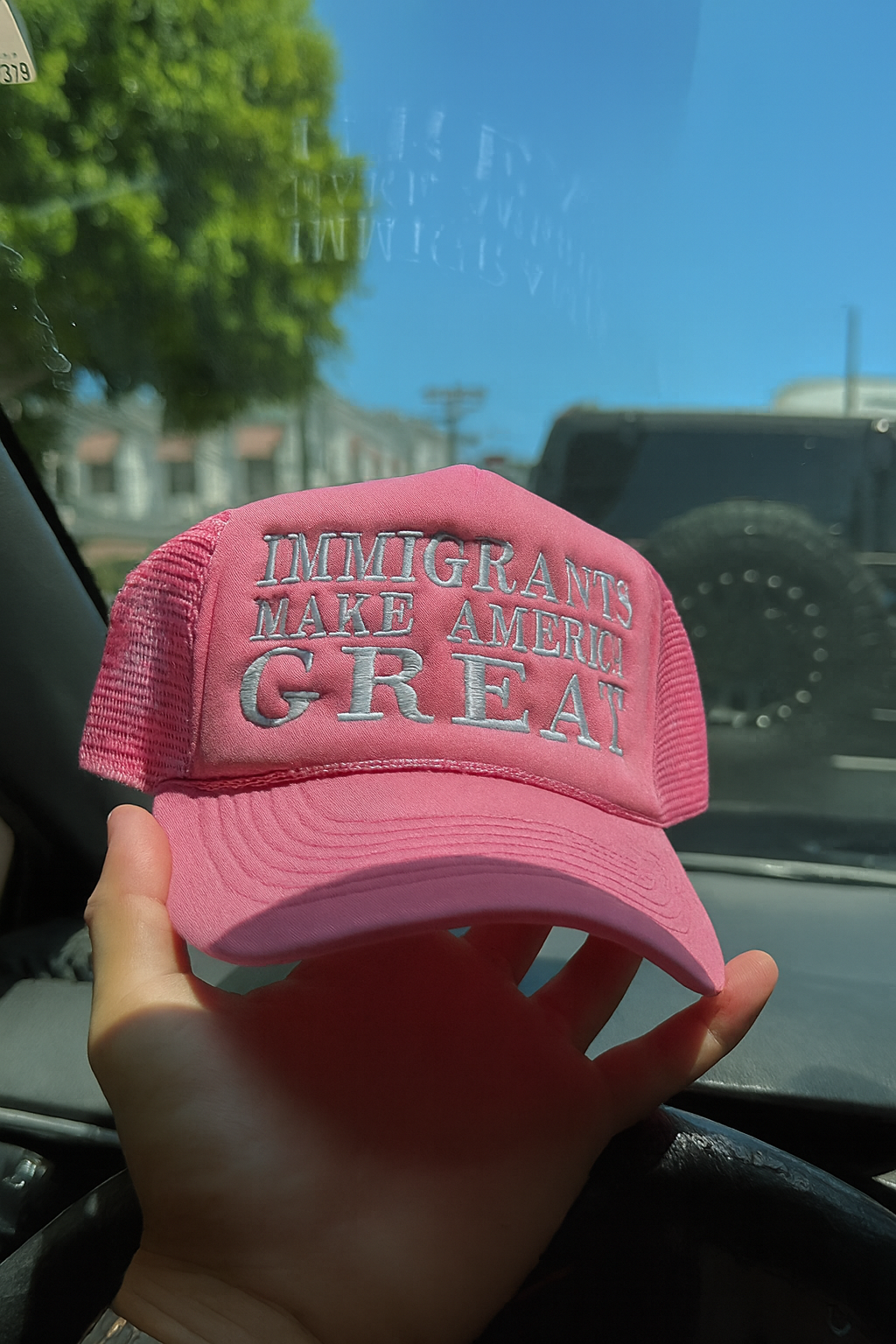 IMMIGRANTS MAKE AMERICA GREAT TRUCKER HAT